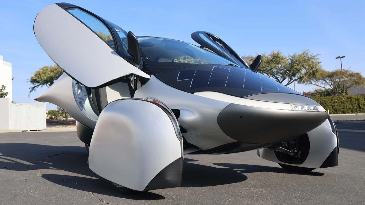 Solar car with integrated solar panels charging in sunlight